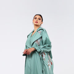 Practical armband, hand-embroidered with rayon threads and soft quilting.