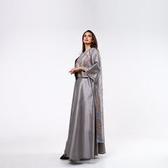 Elegant and distinctive dress-style gown with hand embroidery