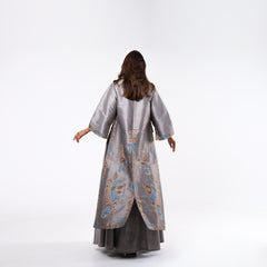 Elegant and distinctive dress-style gown with hand embroidery