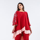 A very elegant suit, distinguished by its luxurious handwork.