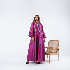 A very elegant dress, distinguished by its luxurious handwork, sequins, embroidery, and motifs.