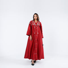 A very elegant and luxurious dress, distinguished by its handwork, sequins and embroidery.