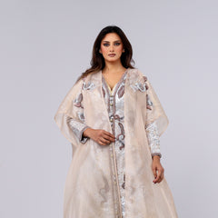 A handcrafted piece of art made of woven fabric, threads, sequins and Japanese beads. A 4-piece dress.