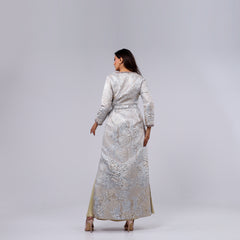 A handcrafted piece of art made of woven fabric, threads, sequins and Japanese beads. A 4-piece dress.