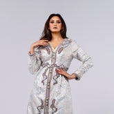 A handcrafted piece of art made of woven fabric, threads, sequins and Japanese beads. A 4-piece dress.