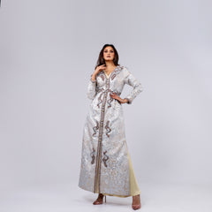 A handcrafted piece of art made of woven fabric, threads, sequins and Japanese beads. A 4-piece dress.