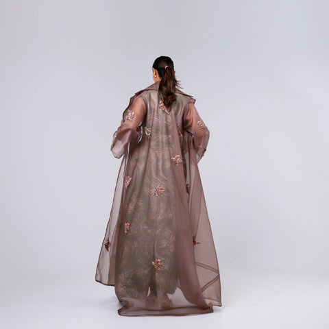 A handcrafted piece of art made of Japanese jacquard, threads, sequins, and beads, and Italian caesar.
