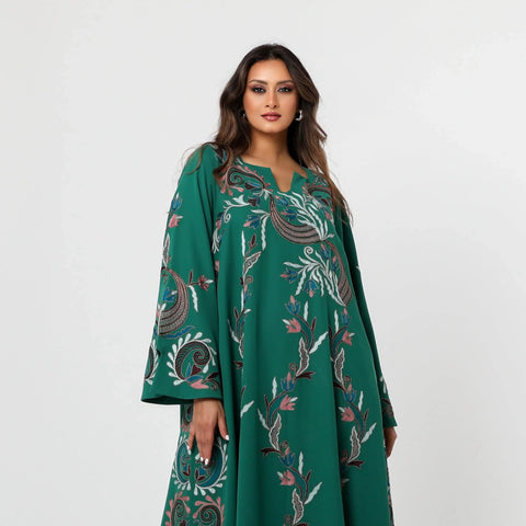 A luxurious Kuwaiti draaa with hand embroidery on Italian crepe - elegance in green