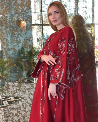 A luxurious, hand-made daraa with sequins and a round neckline 