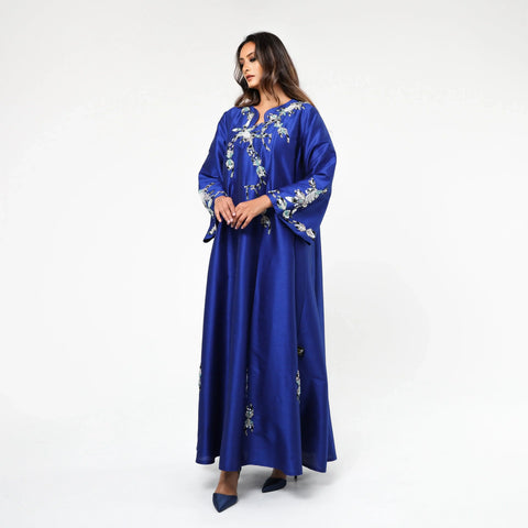 Very luxurious hand-embroidered dress with embroidery, beads and pearls