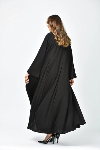 Plain, formal, triple-cloche abaya with vertical cuts from Tahani Boutique
