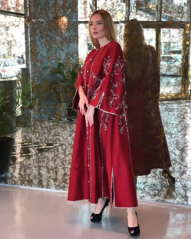 A luxurious, hand-made daraa with sequins and a round neckline 