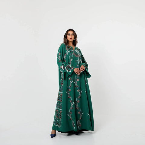 A luxurious Kuwaiti draaa with hand embroidery on Italian crepe - elegance in green