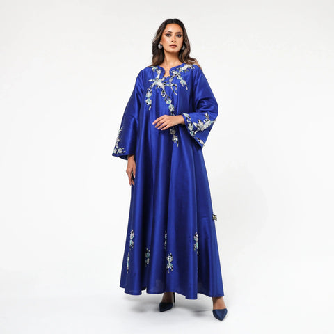 Very luxurious hand-embroidered dress with embroidery, beads and pearls