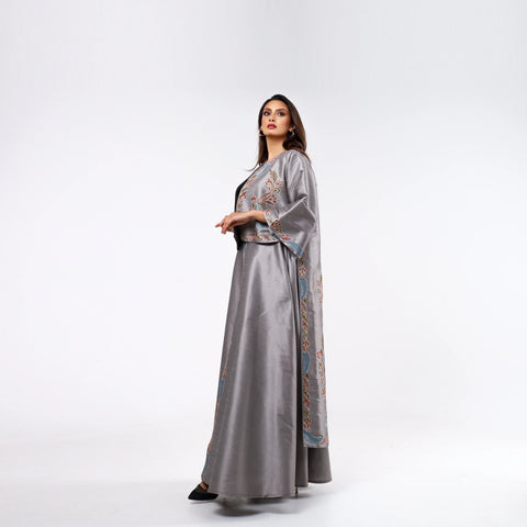 Elegant and distinctive dress-style gown with hand embroidery