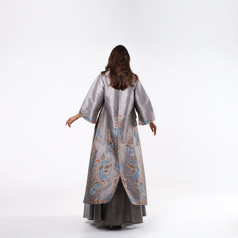 Elegant and distinctive dress-style gown with hand embroidery