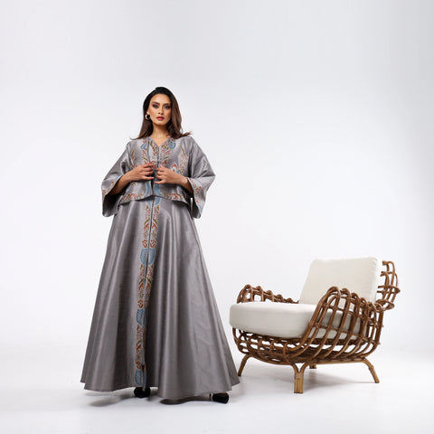 Elegant and distinctive dress-style gown with hand embroidery