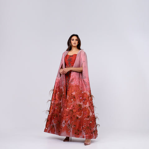 A handcrafted piece of art made of woven fabric, threads, sequins, Japanese beads and soft feathers.