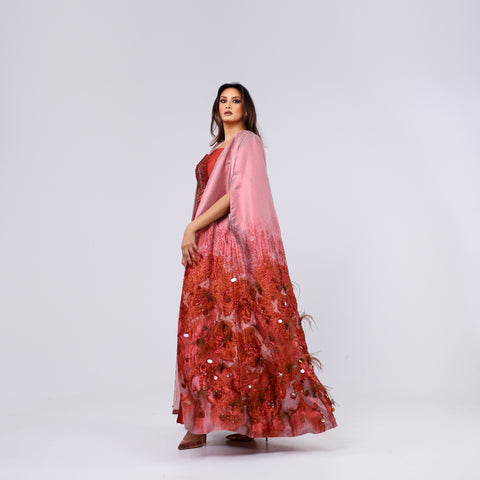A handcrafted piece of art made of woven fabric, threads, sequins, Japanese beads and soft feathers.