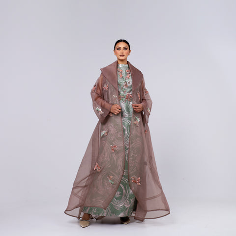 A handcrafted piece of art made of Japanese jacquard, threads, sequins, and beads, and Italian caesar.