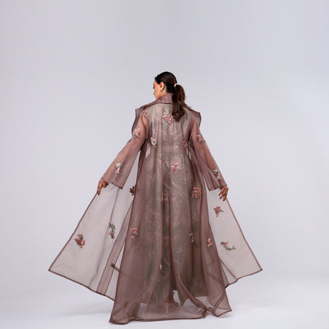 A handcrafted piece of art made of Japanese jacquard, threads, sequins, and beads, and Italian caesar.