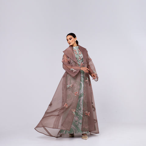 A handcrafted piece of art made of Japanese jacquard, threads, sequins, and beads, and Italian caesar.