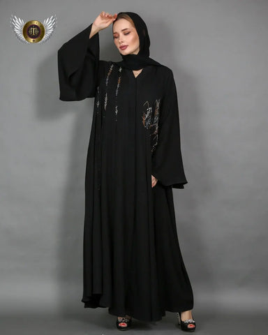 Black abaya with a distinctive handmade pattern 