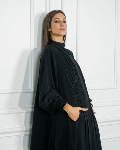 Black double-cloche abaya made of a special dew-like fabric from Tahani Boutique