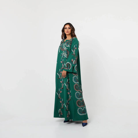 A luxurious Kuwaiti draaa with hand embroidery on Italian crepe - elegance in green