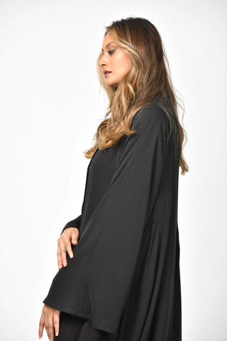 Plain triple-cloche abaya with cuts and pleats from Tahani Boutique