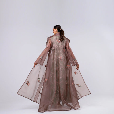 A handcrafted piece of art made of Japanese jacquard, threads, sequins, and beads, and Italian caesar.