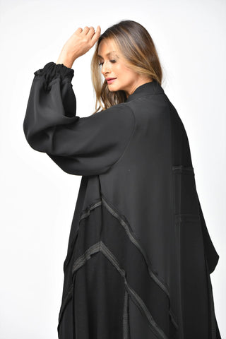 Plain triple-cloche abaya from Tahani Boutique