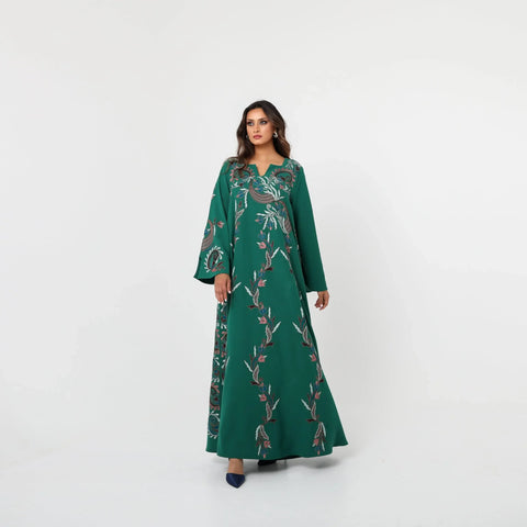 A luxurious Kuwaiti draaa with hand embroidery on Italian crepe - elegance in green