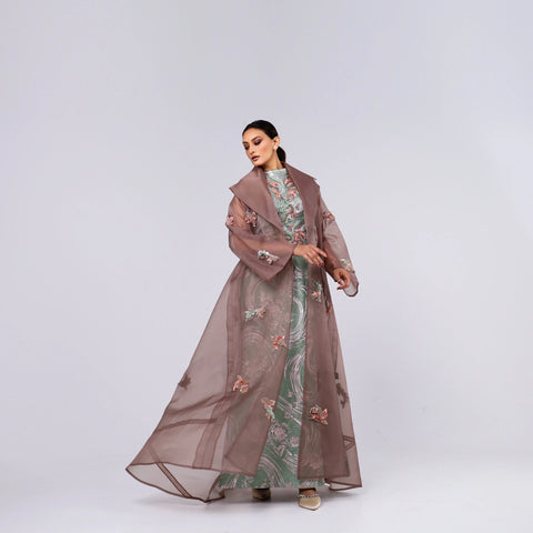 A handcrafted piece of art made of Japanese jacquard, threads, sequins, and beads, and Italian caesar.