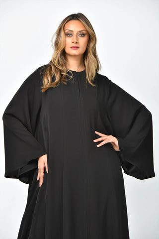 Plain crepe abaya with vertical cuts and triple flares from Tahani Boutique