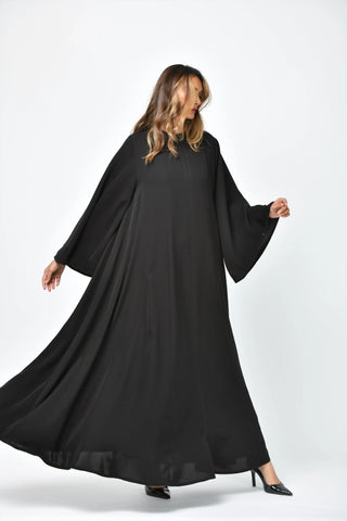 Plain crepe abaya with vertical cuts and triple flares from Tahani Boutique