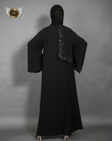 Black abaya with a distinctive handmade pattern 