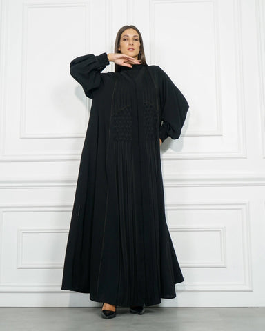 Black double-cloche abaya made of a special dew-like fabric from Tahani Boutique