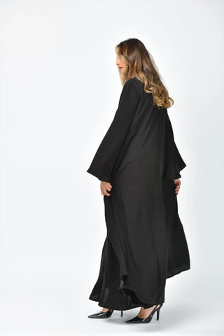Plain crepe abaya with vertical cuts and triple flares from Tahani Boutique