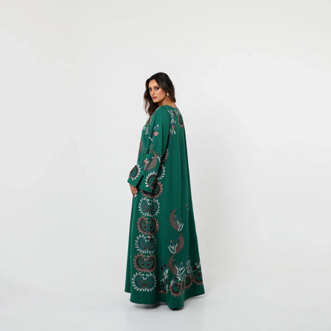 A luxurious Kuwaiti draaa with hand embroidery on Italian crepe - elegance in green