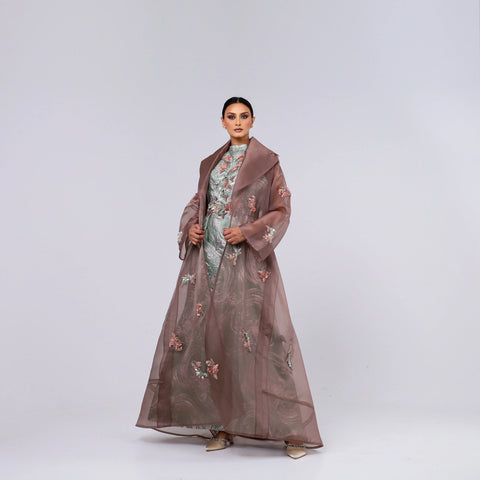 A handcrafted piece of art made of Japanese jacquard, threads, sequins, and beads, and Italian caesar.