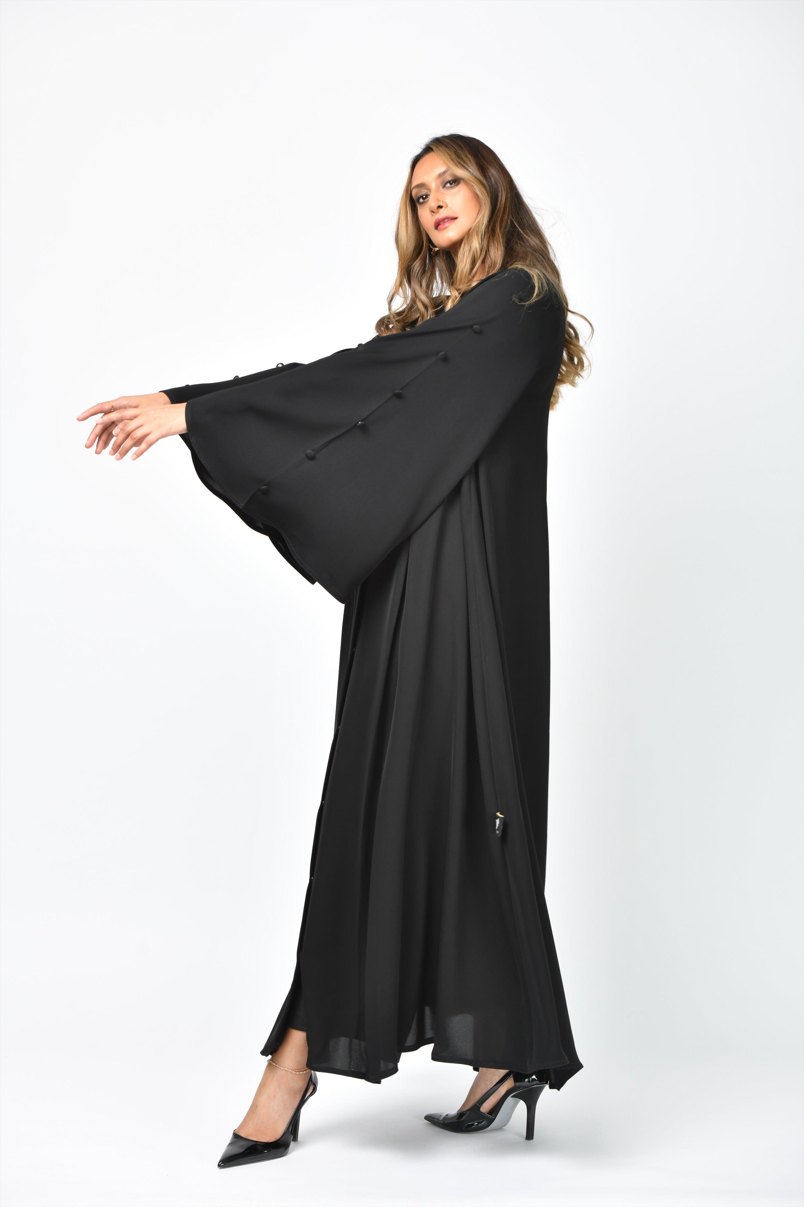 عباية سادة كريب تربل كلوش بتصميم أنيق - tahaniboutique