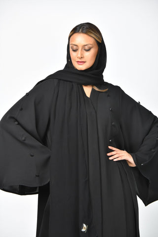 عباية سادة كريب تربل كلوش بتصميم أنيق - tahaniboutique